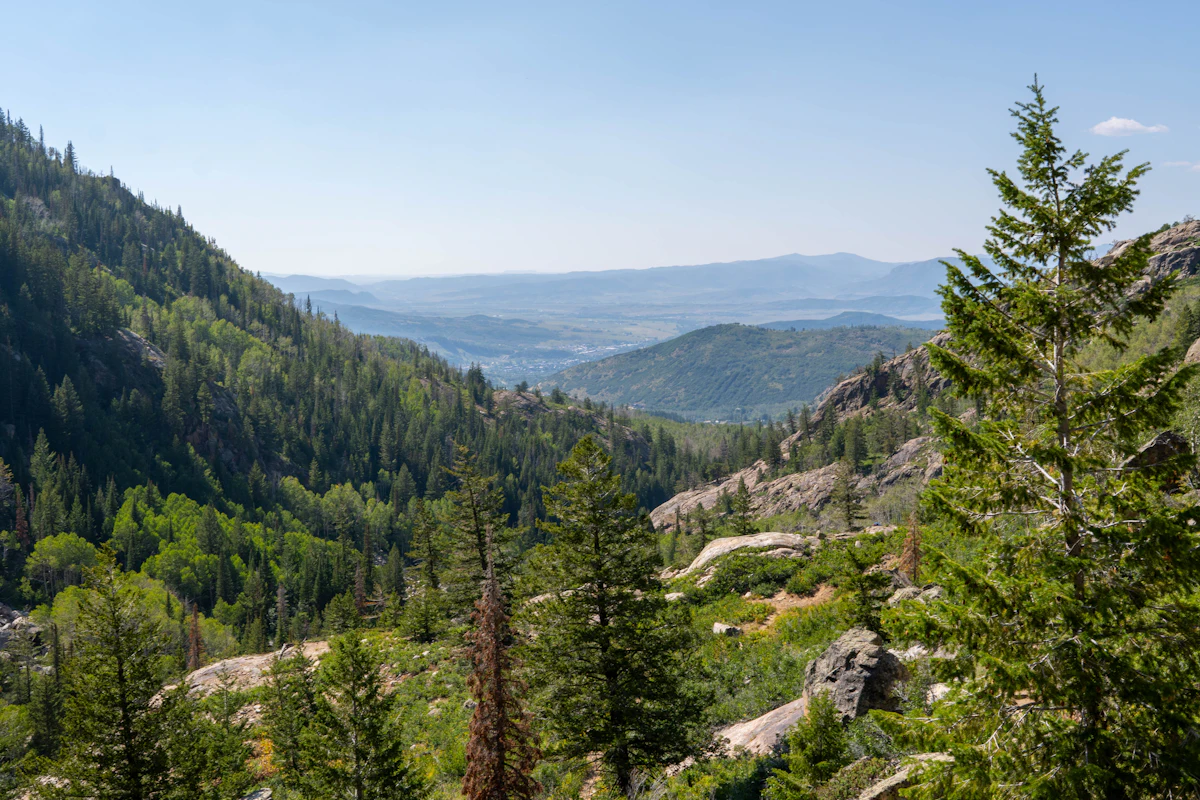 A view over forested ridges and granite outcrops near Steamboat Springs
