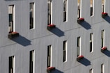 A building with many windows and a clock on it