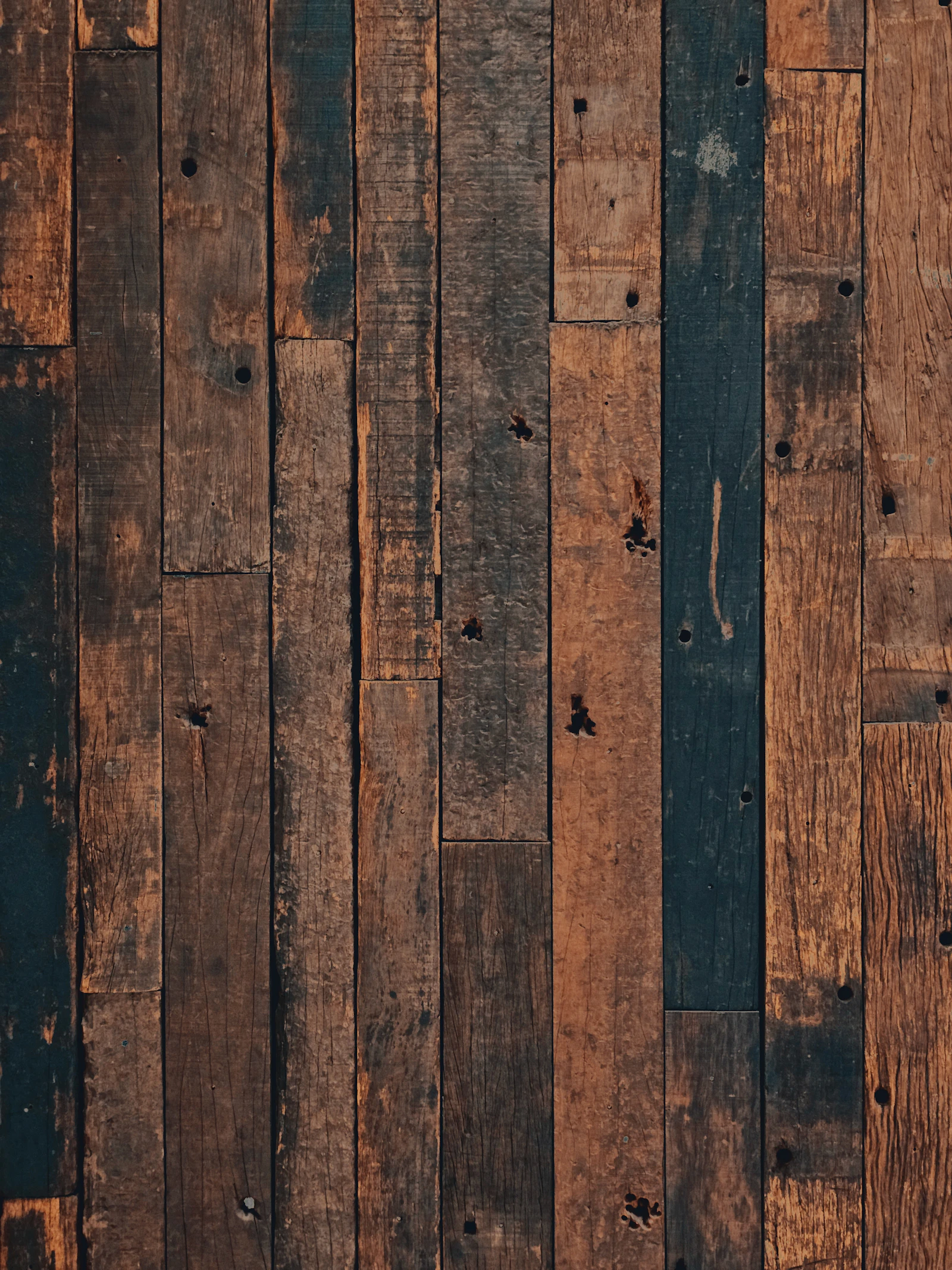 A close-up of a refinished wood floor surface
