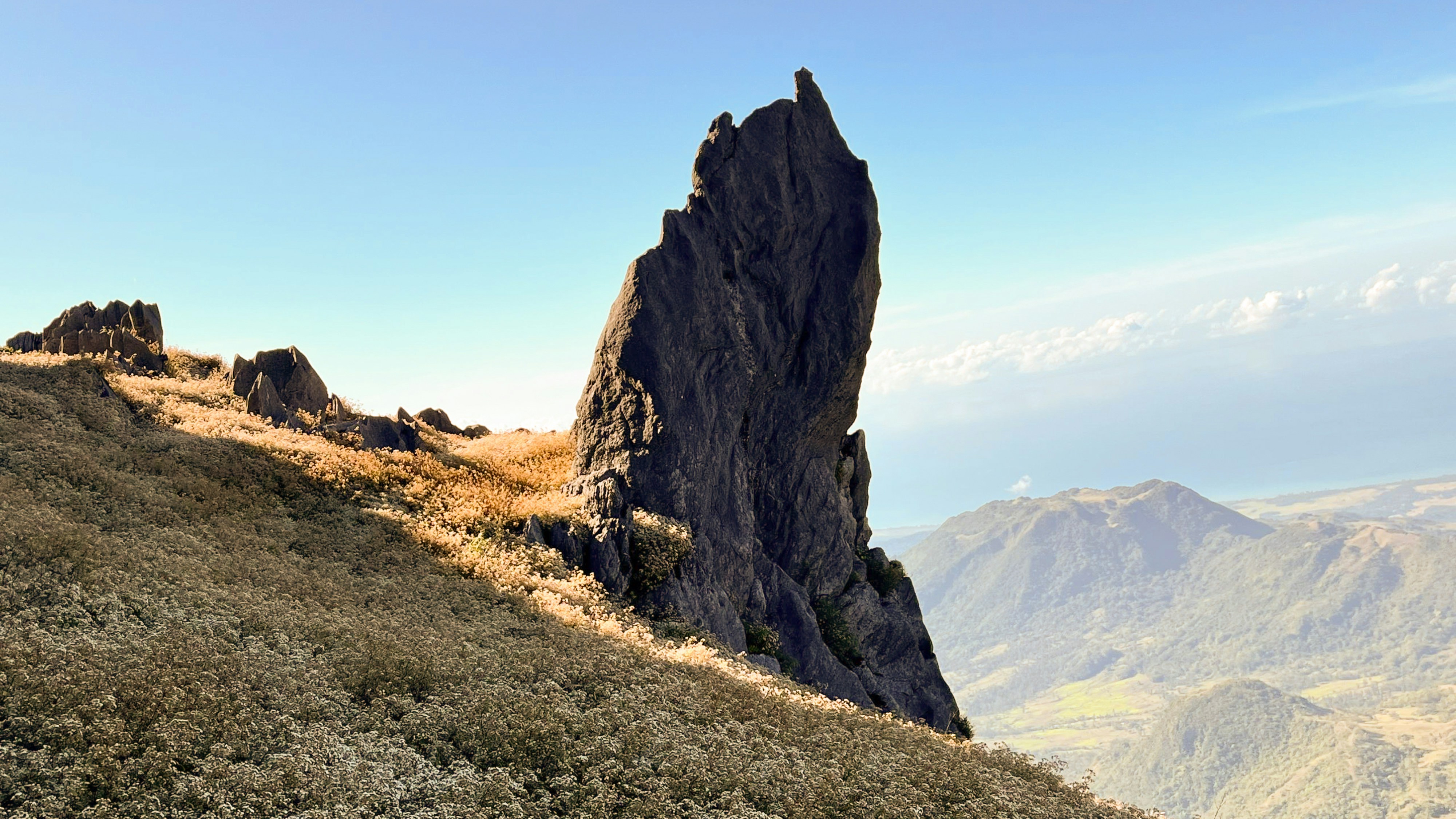 A large rock on the side of a mountain photo – Free Scenery Image on ...