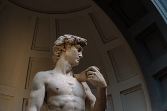 A statue of a man standing in a room