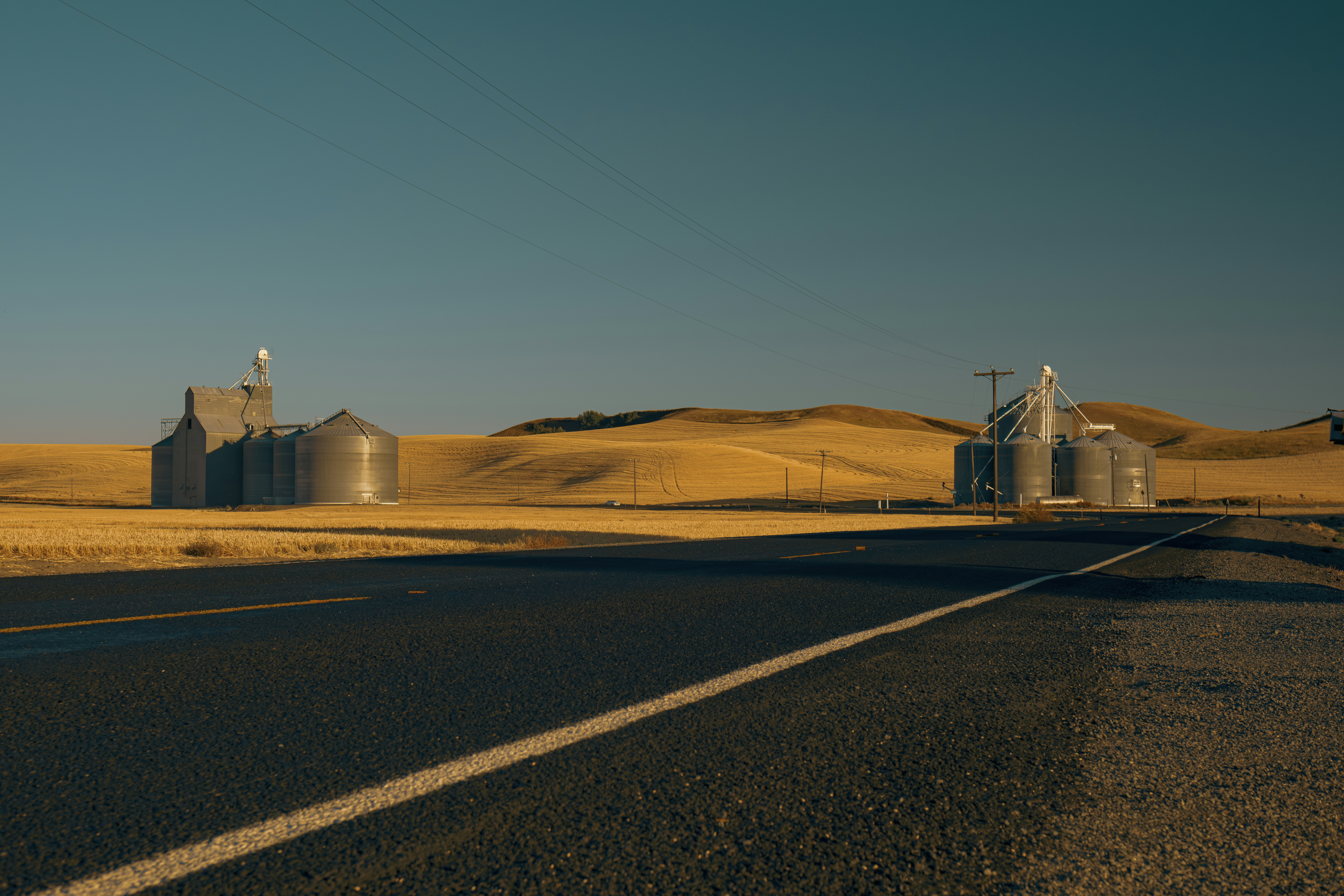 An empty road in the middle of a desert