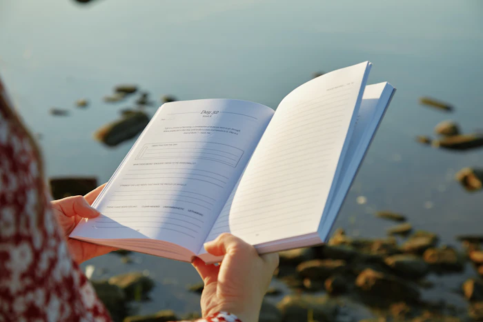 Self-care journal by the water