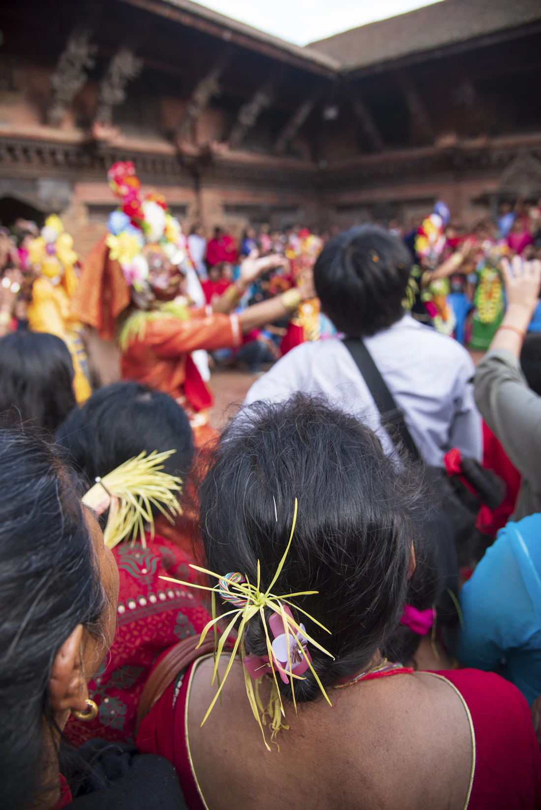 Families in traditional dress celebrating Dashain in Nepal