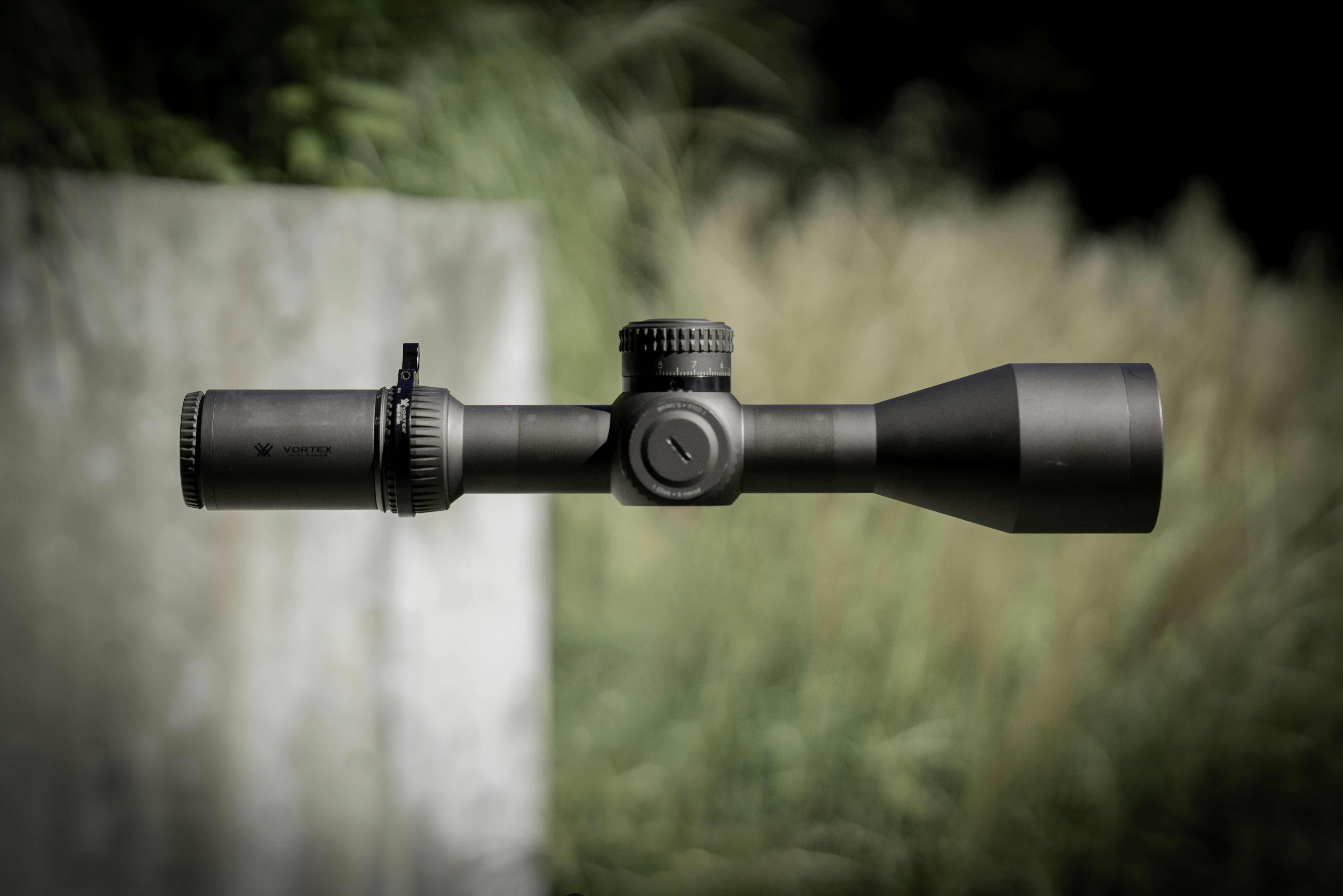 A close up shot of a rifle scope