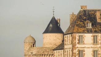 A large building with a tower and a clock on it