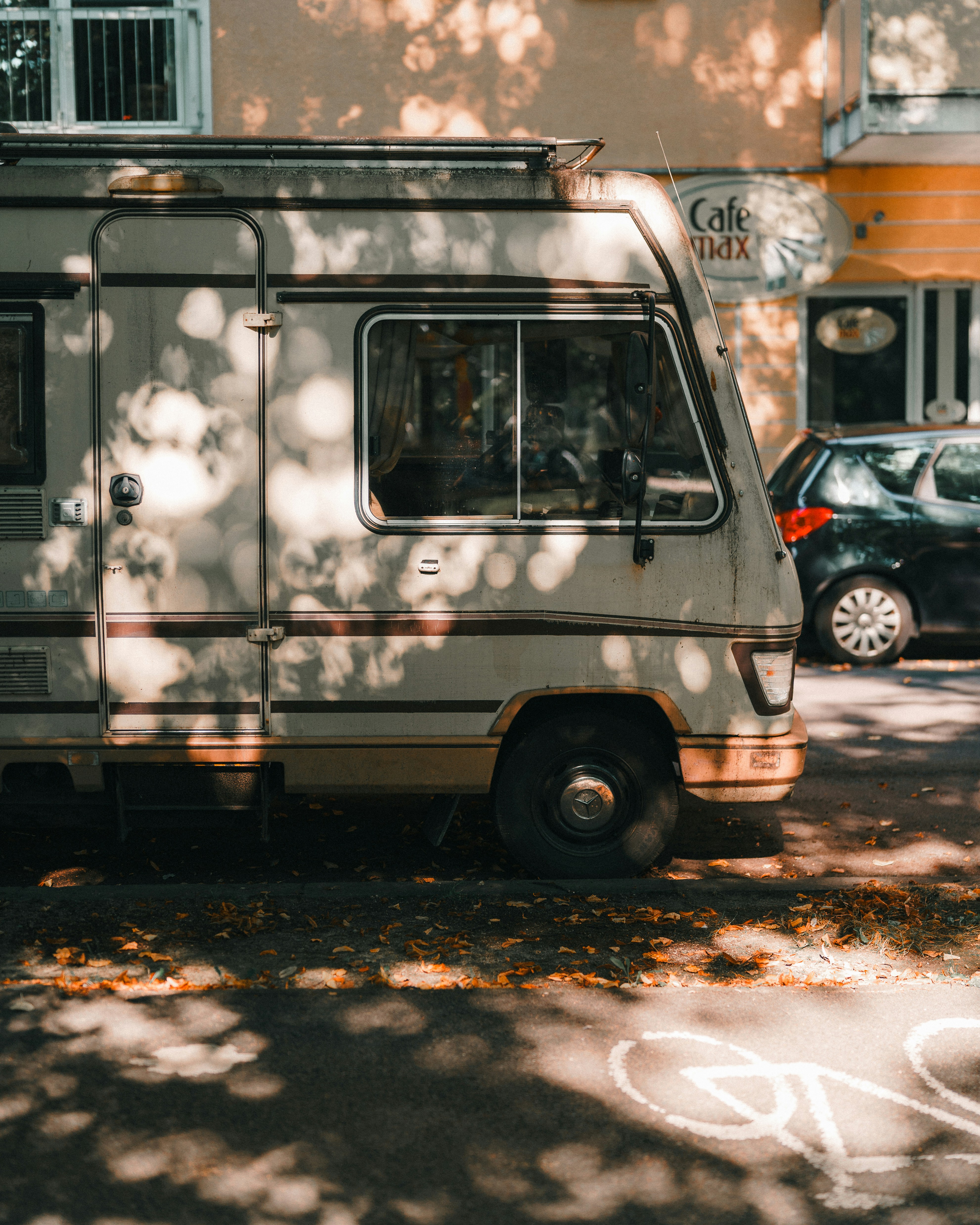A motor home parked on the side of the road