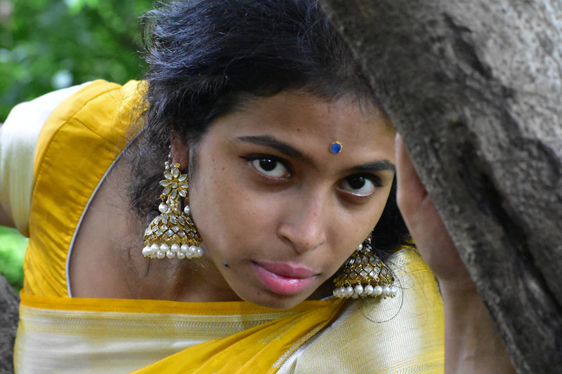 Stunning Indian woman in yellow sari