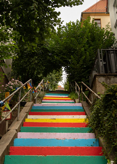A set of colorful stairs painted in different colors