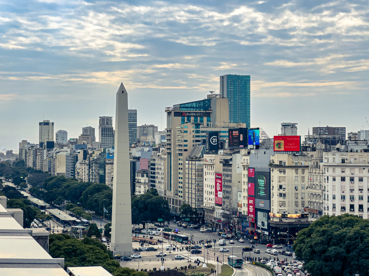 The Obelisk and Avenida 9 de Julio surrounded by the Buenos Aires skyline