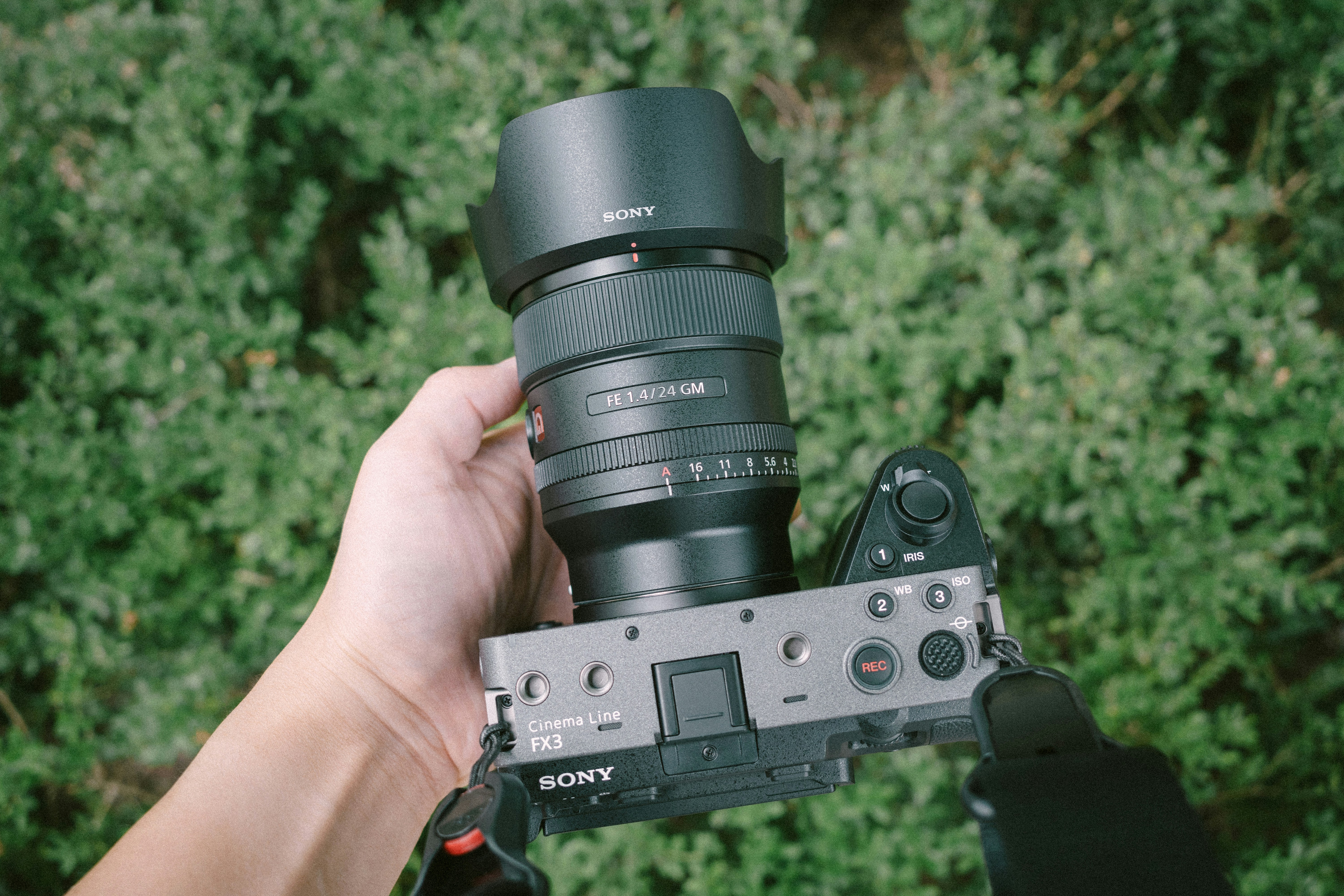 A person holding a camera up to take a picture