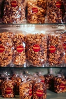 A bunch of bags of nuts sitting on a shelf