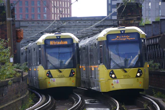 A couple of trains that are on some tracks