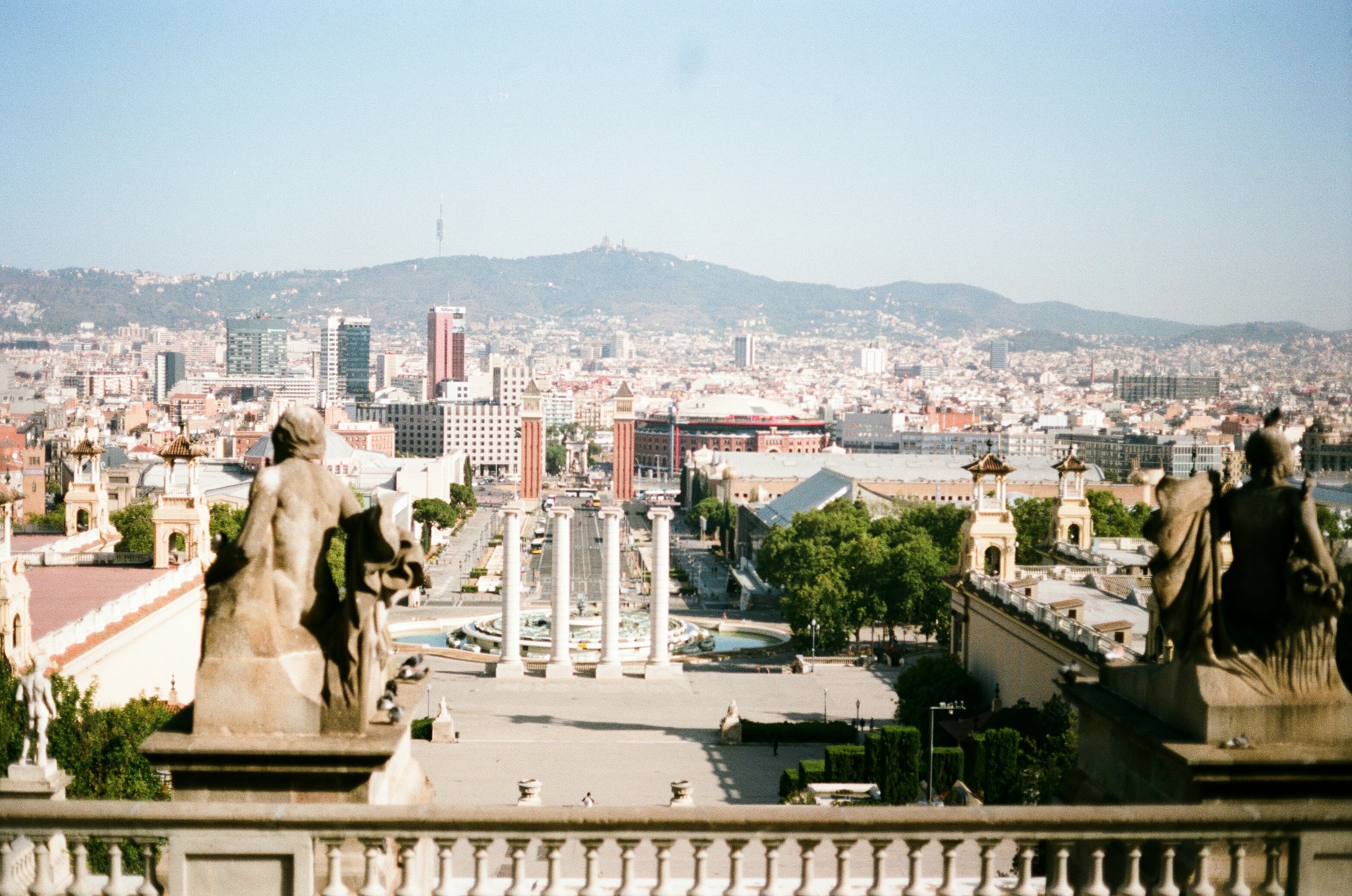A view of a city from the top of a building