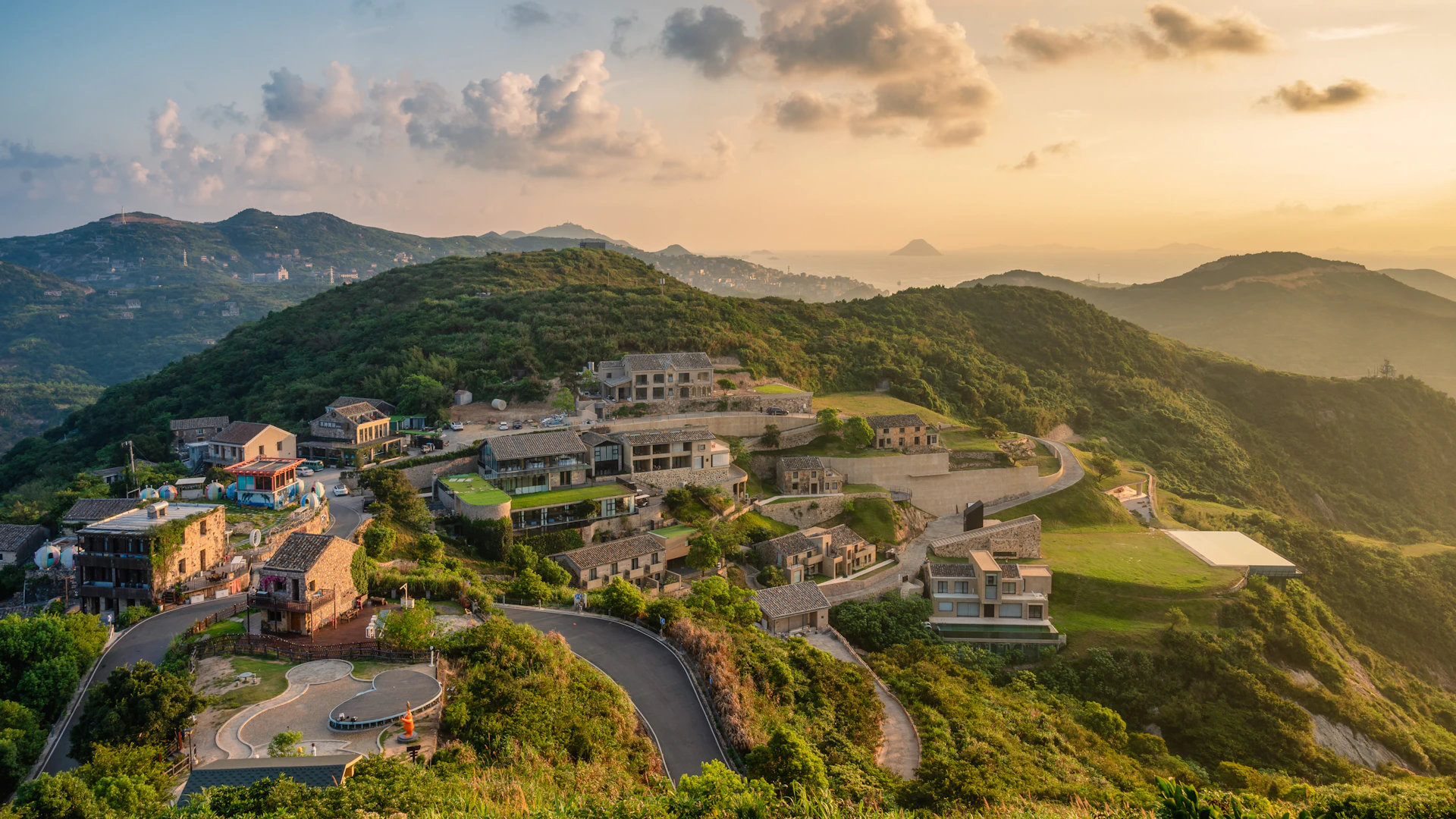 A scenic view of a town on a hill