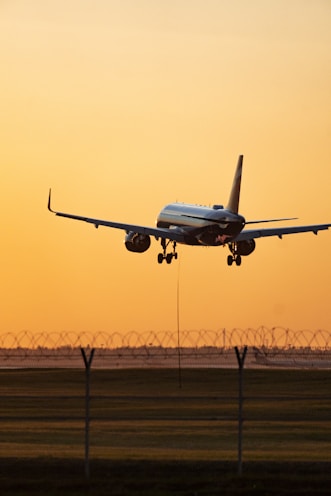 A large jetliner taking off from an airport runway