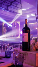 A bottle of wine sitting on top of a table