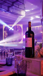 A bottle of wine sitting on top of a table
