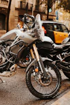 A couple of motorcycles parked next to each other