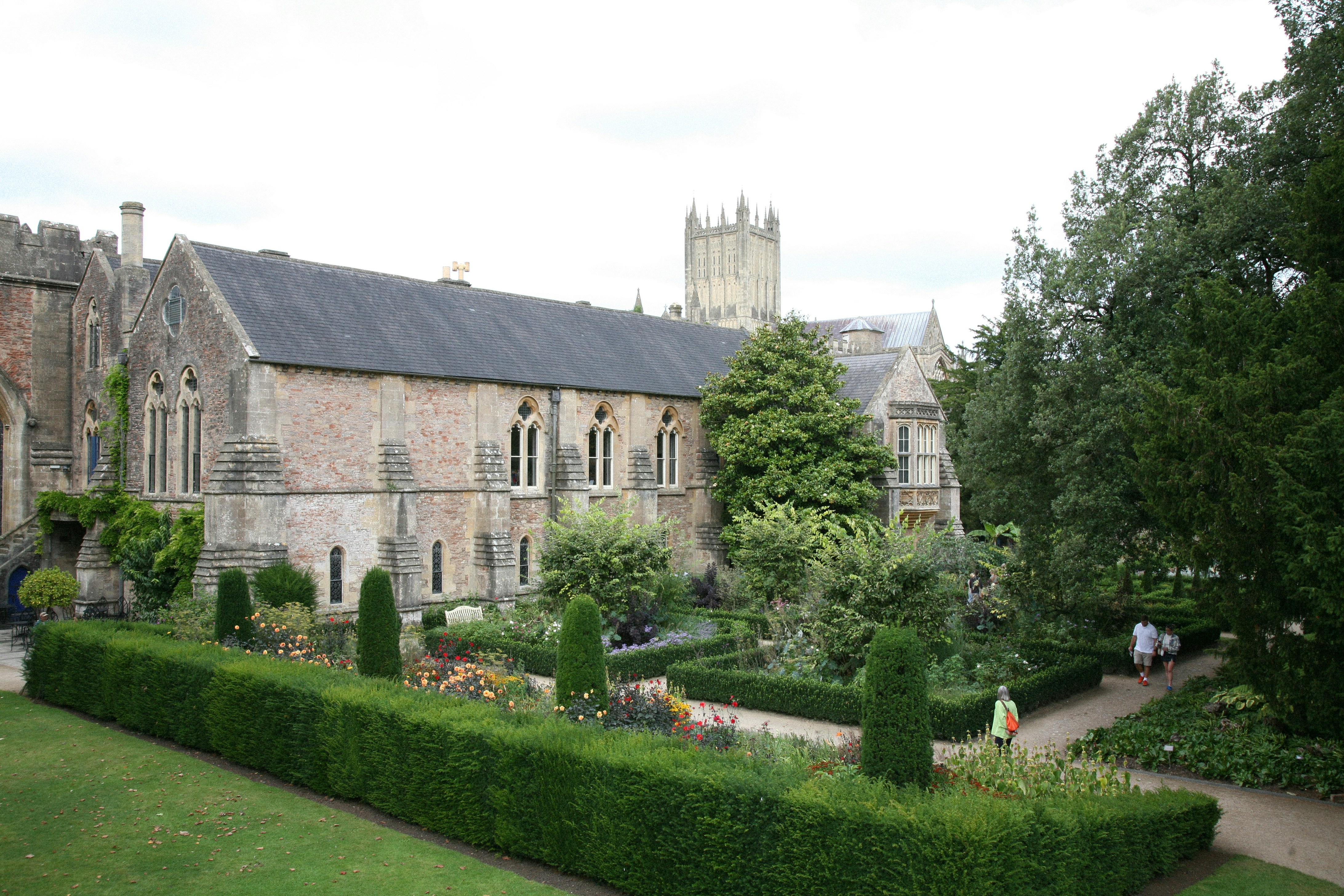 A large building with a garden in front of it