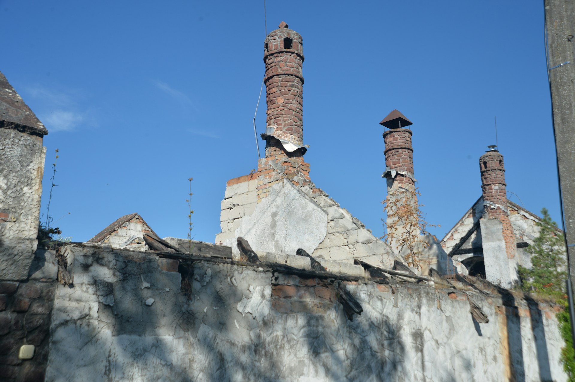 An old building with chimneys on a sunny day