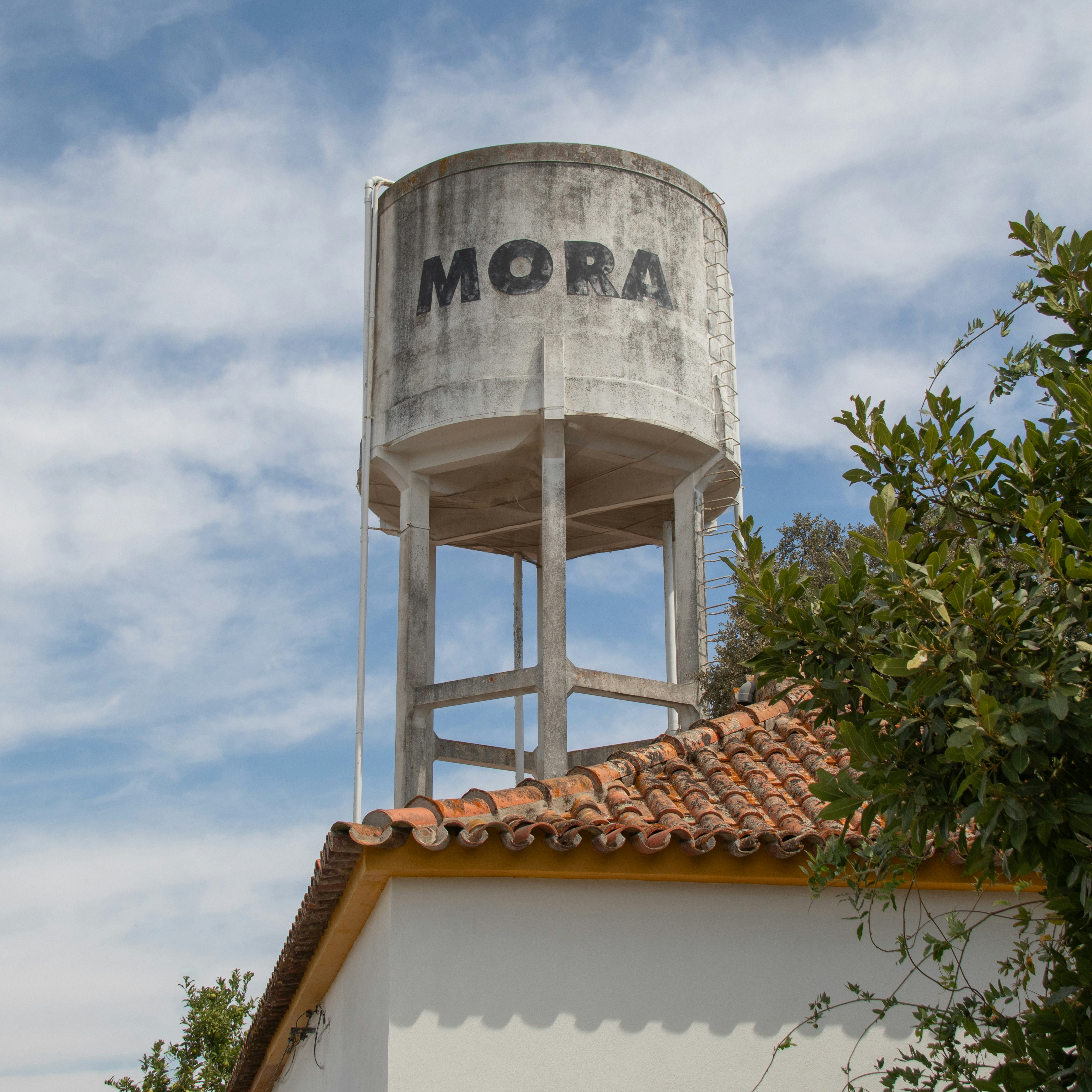 A water tower on top of a building