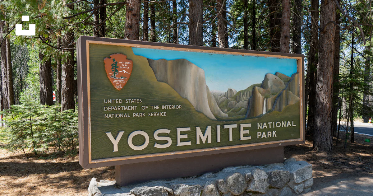 A Sign For Yosemite National Park In The Woods Photo Free Yosemite a-sign-for-yosemite-national-park-in-the-woods-photo-free-yosemite