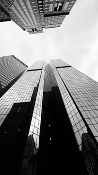 A black and white photo of tall buildings