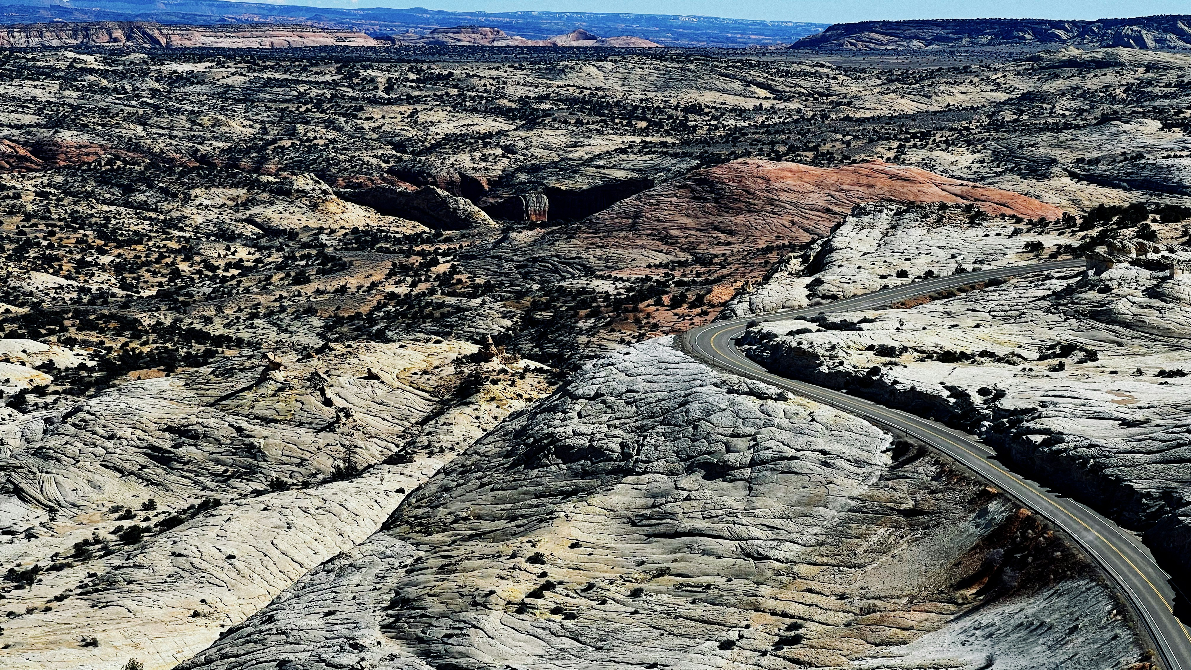 An aerial view of a winding road in the desert photo – Free Utah Image ...