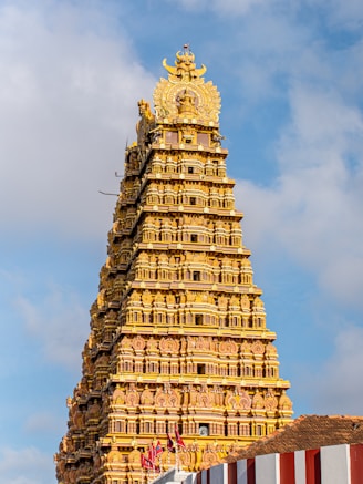 A tall tower with a clock on top of it