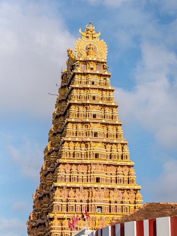 A tall tower with a clock on top of it