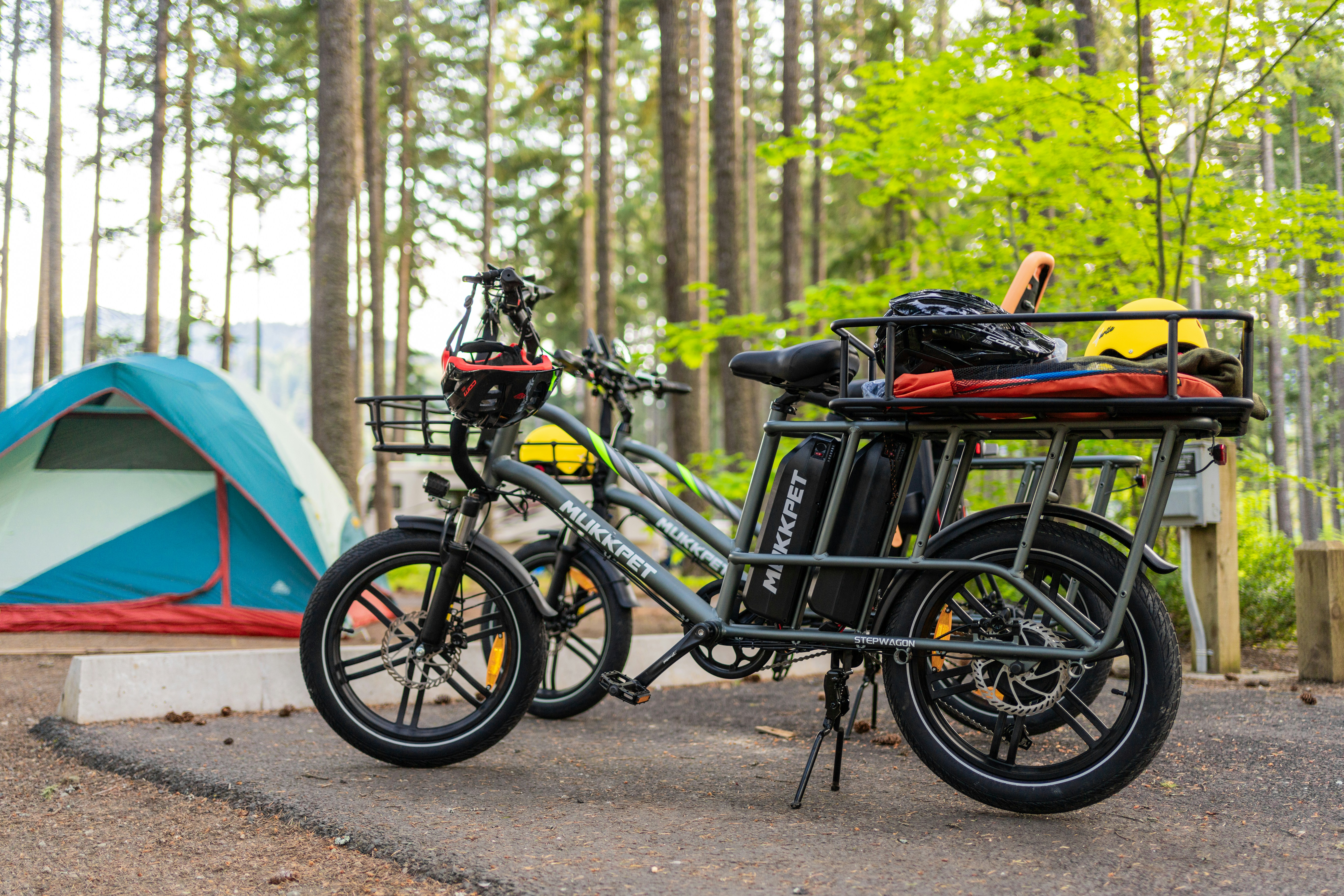 A couple of bikes parked next to a tent