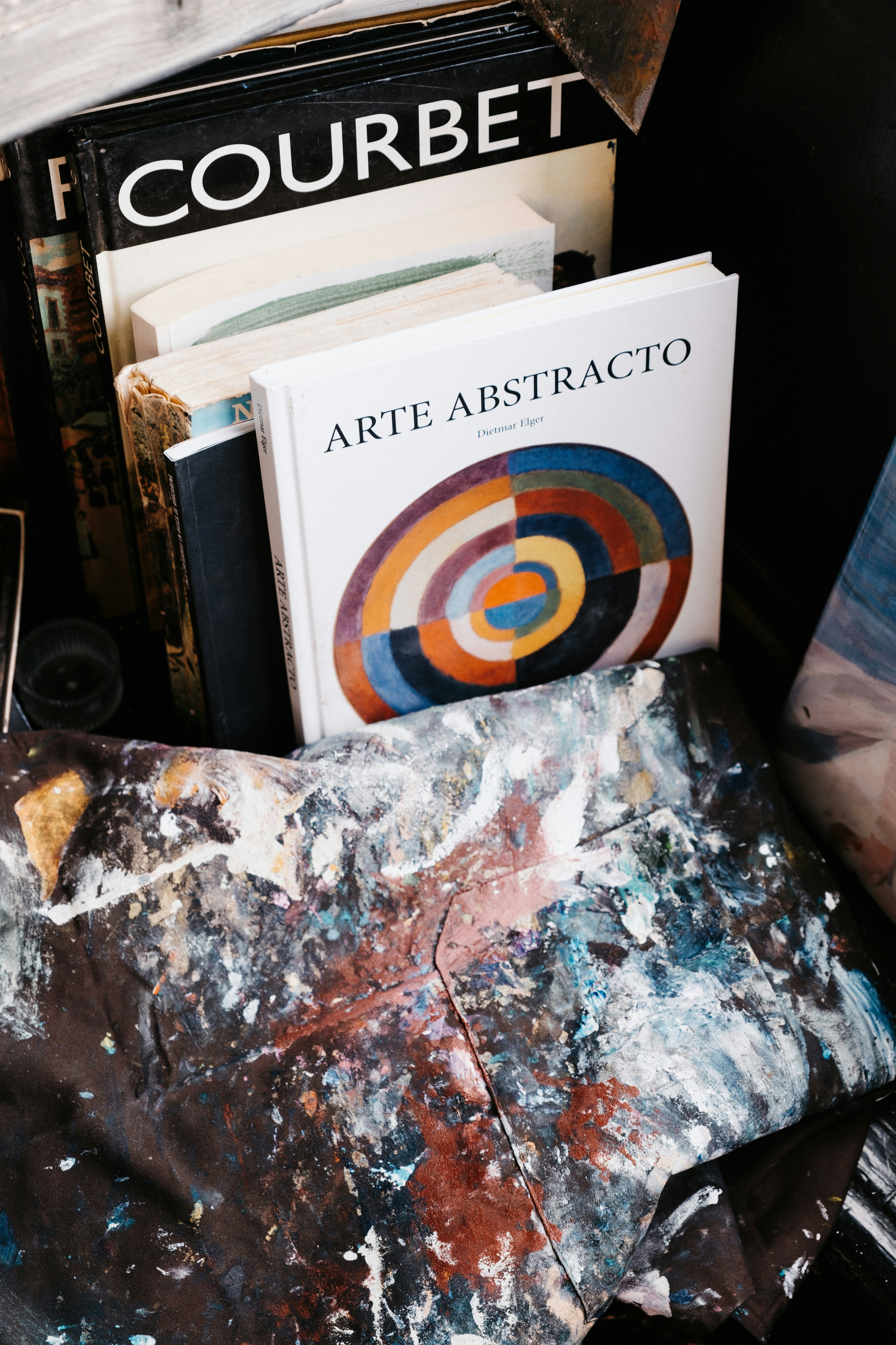 A pile of books on a table — intellectual rigor and the architecture of trust