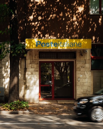 A car is parked in front of a building