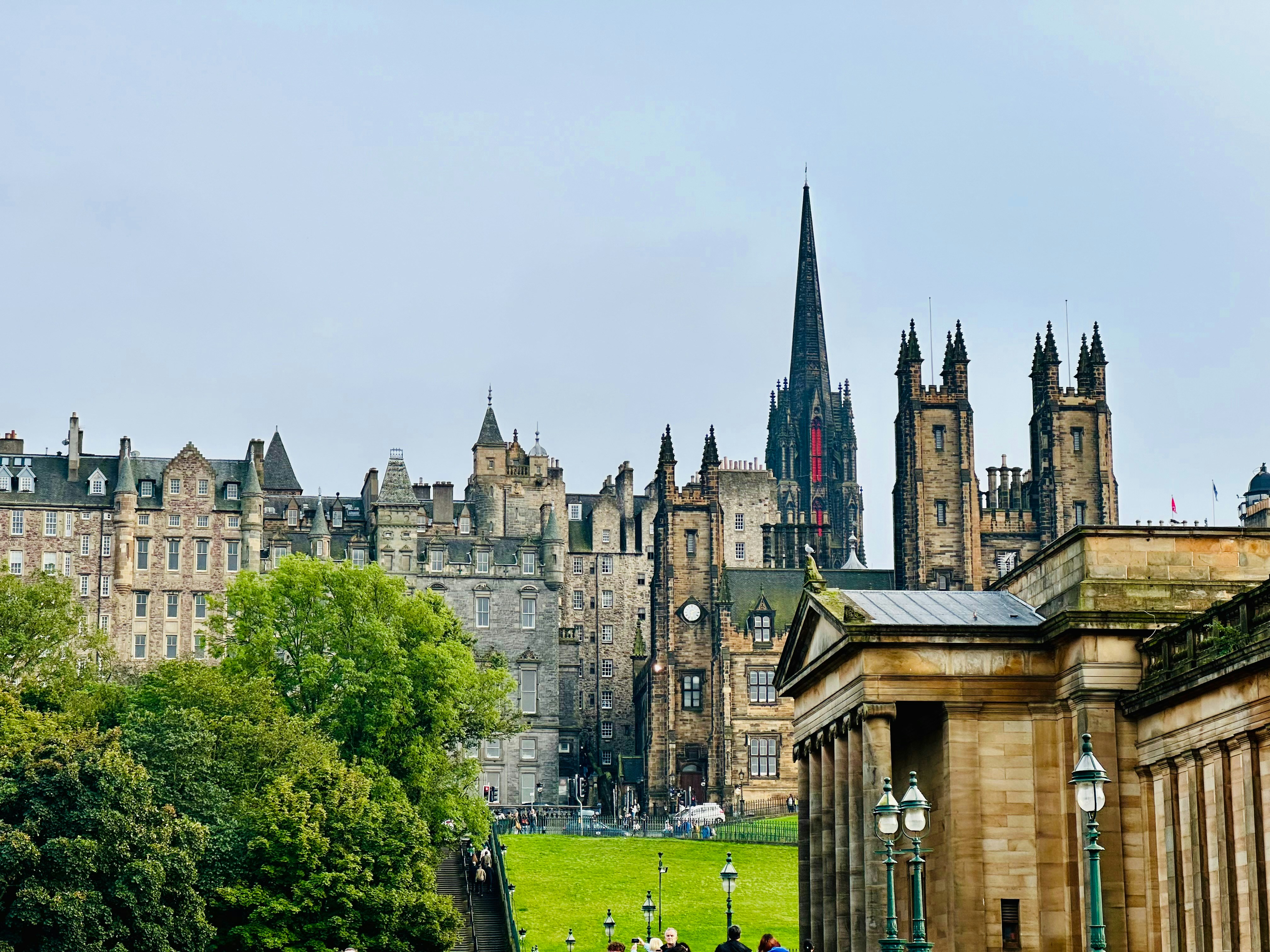 A large building with a clock tower in the middle of it