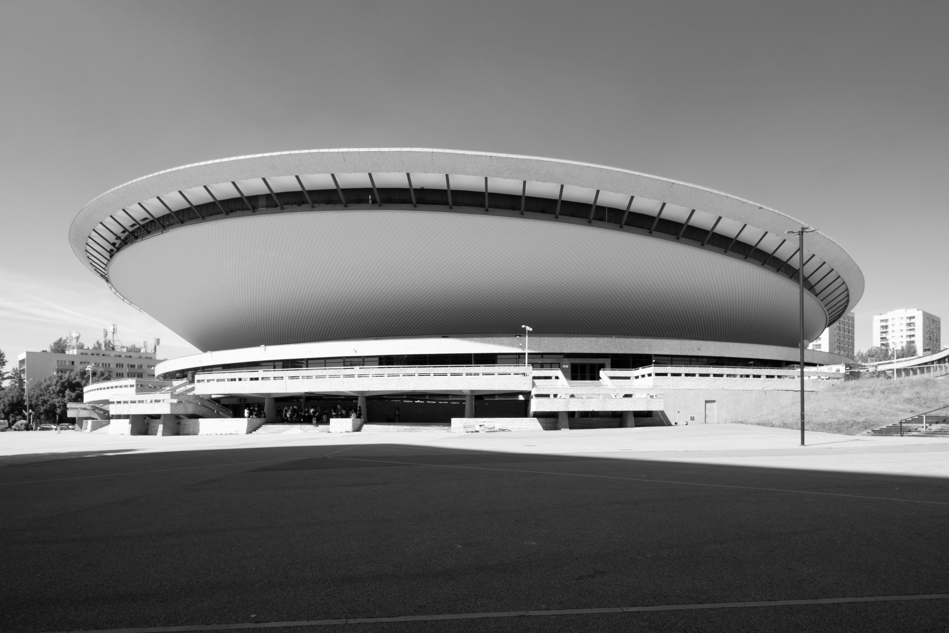 A black and white photo of a large building