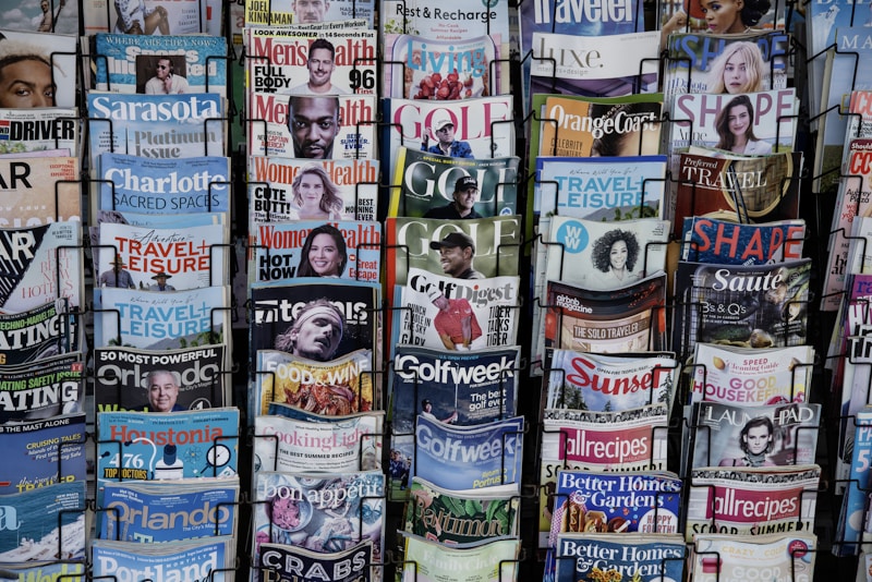 Stack of past Clermont Local Magazine issues