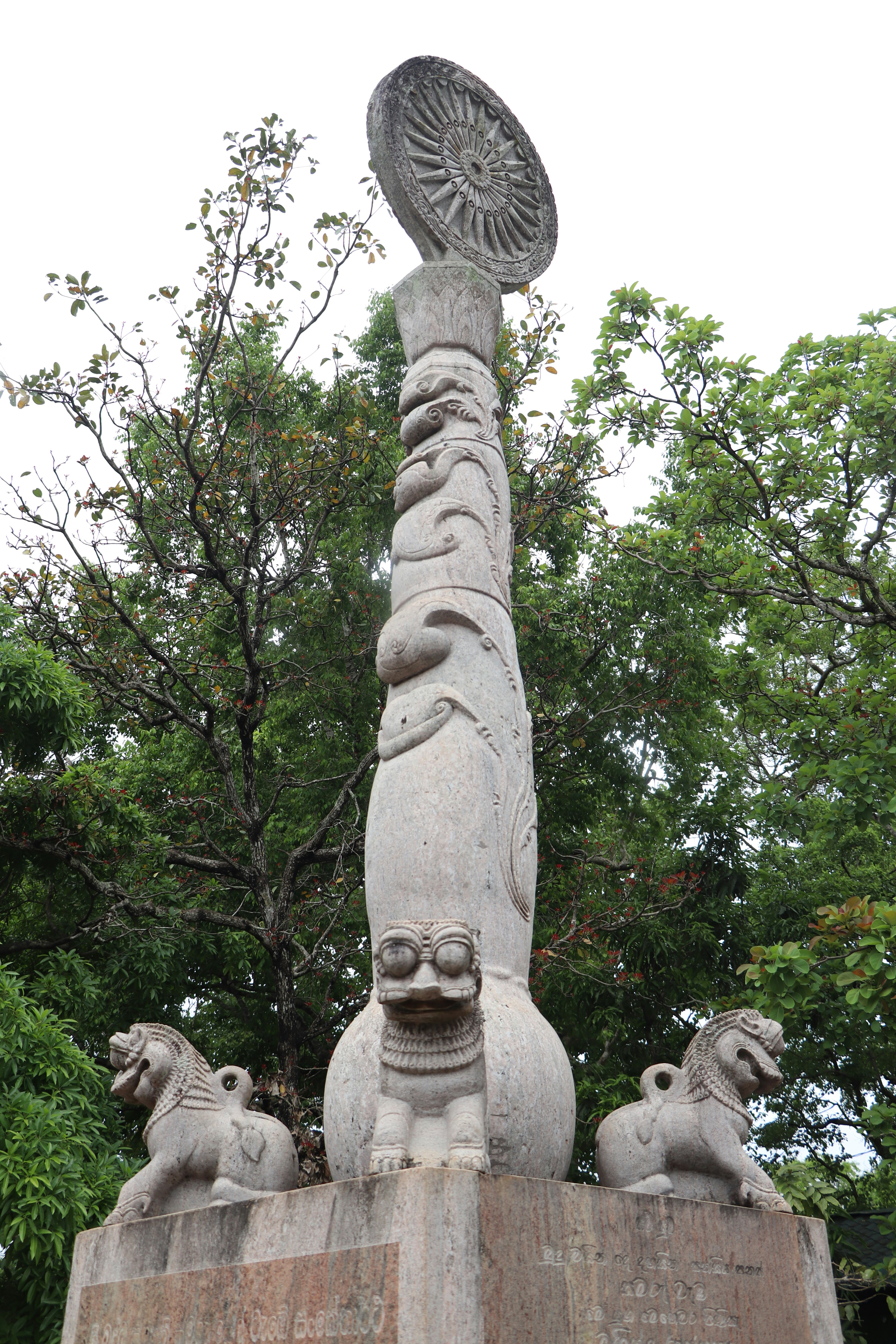 A statue of a person holding a football