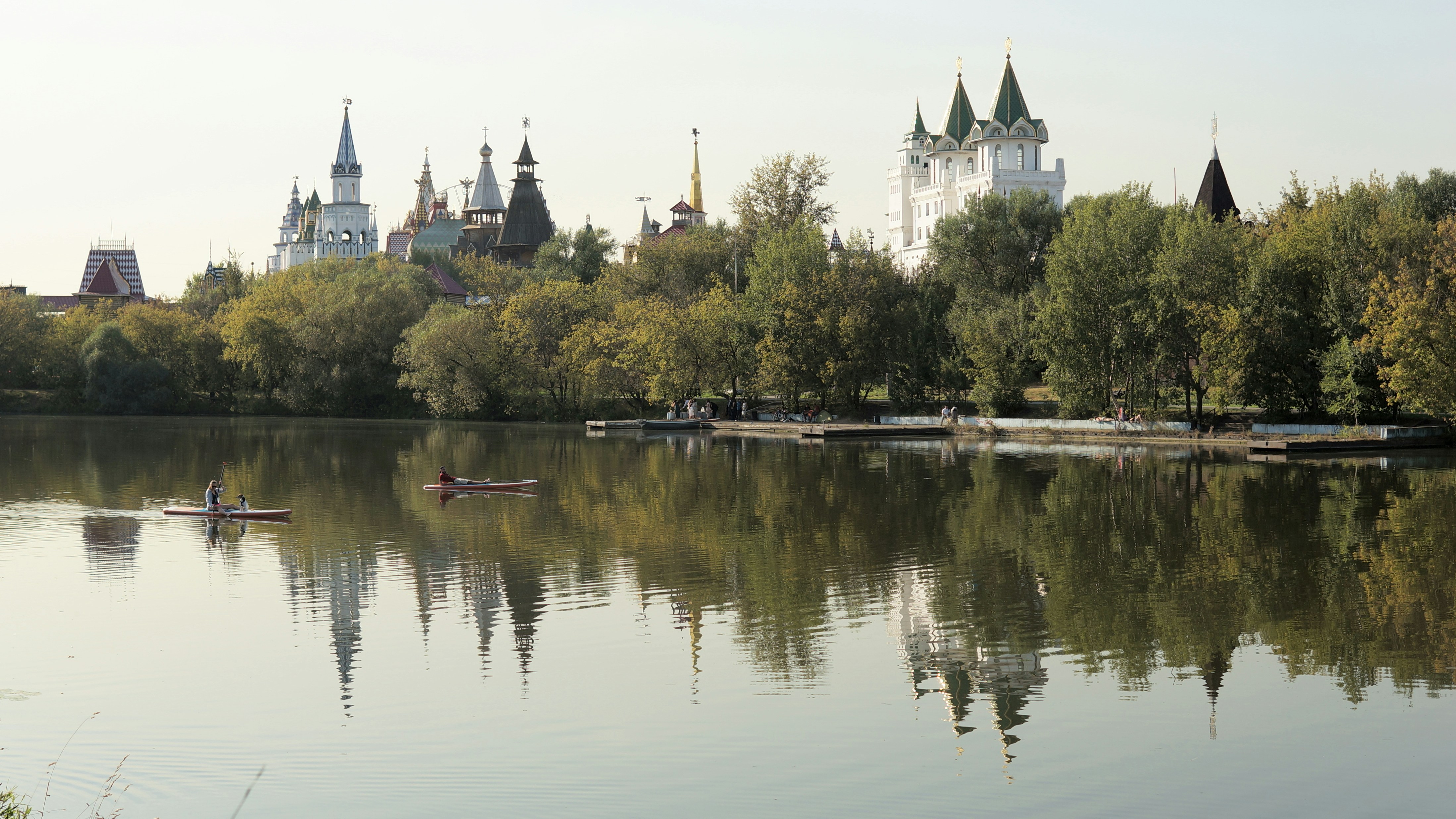 A large body of water surrounded by trees
