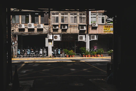 A view of a street from a tunnel in a building