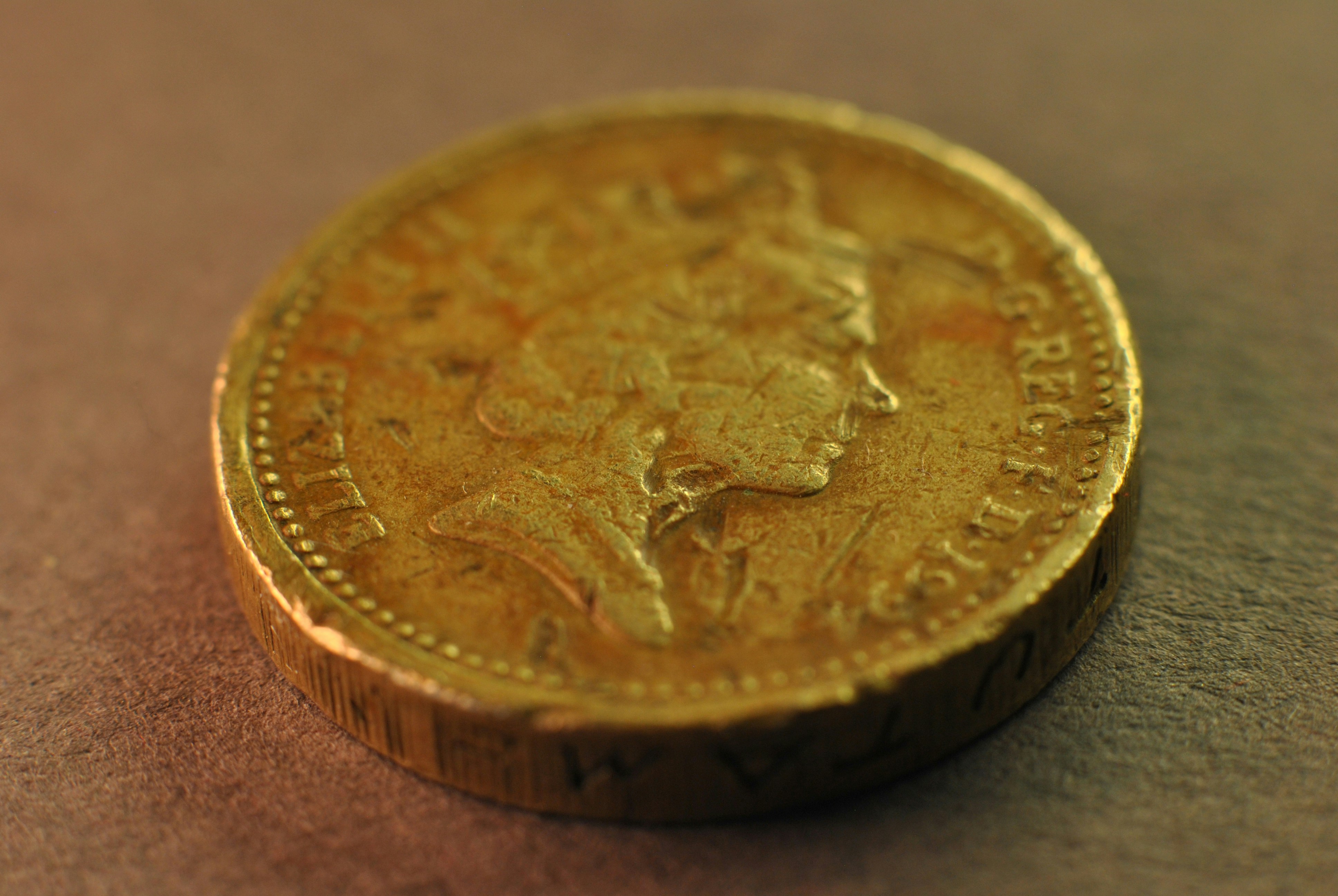 A close up of a coin on a table