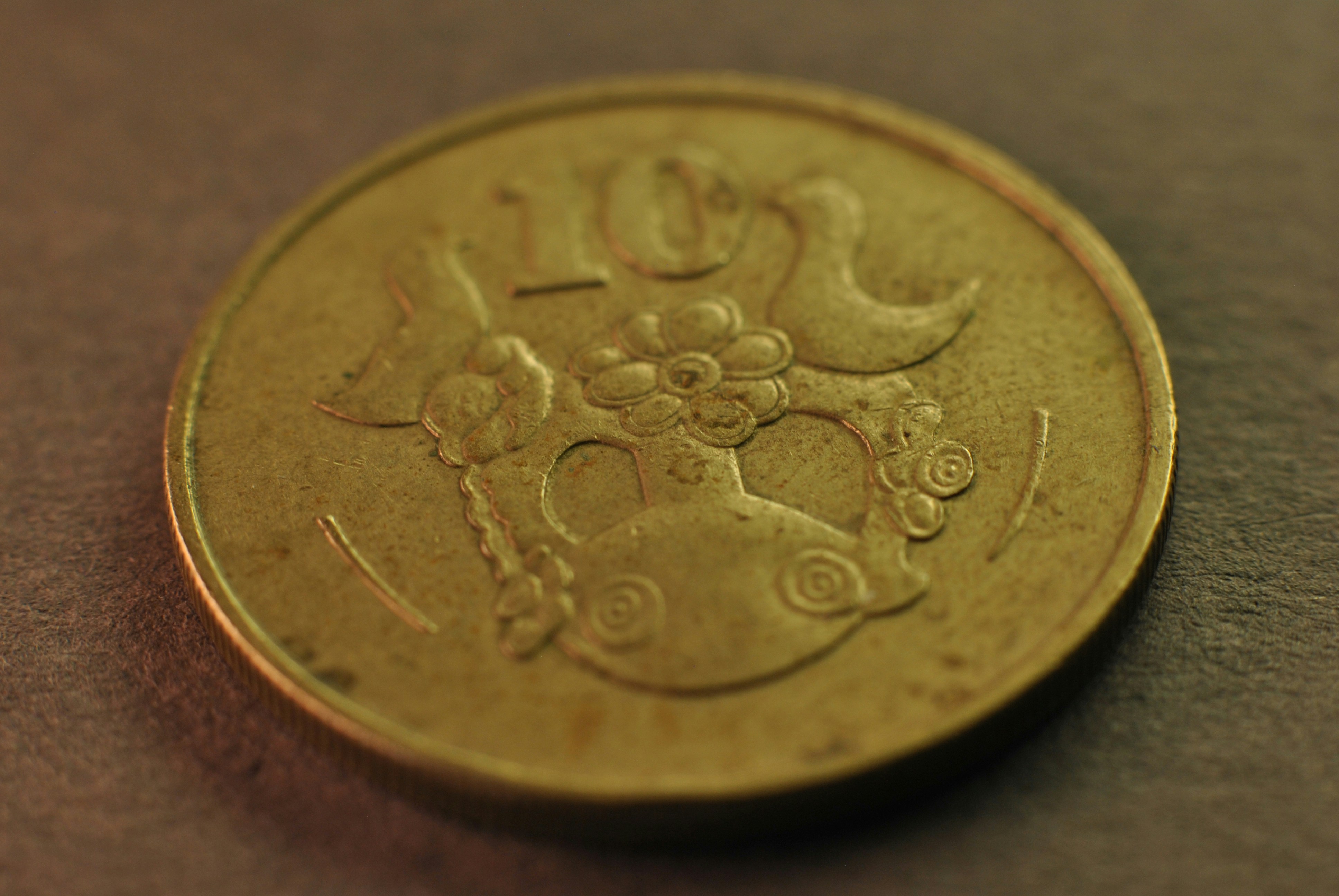 A close up of a coin on a table
