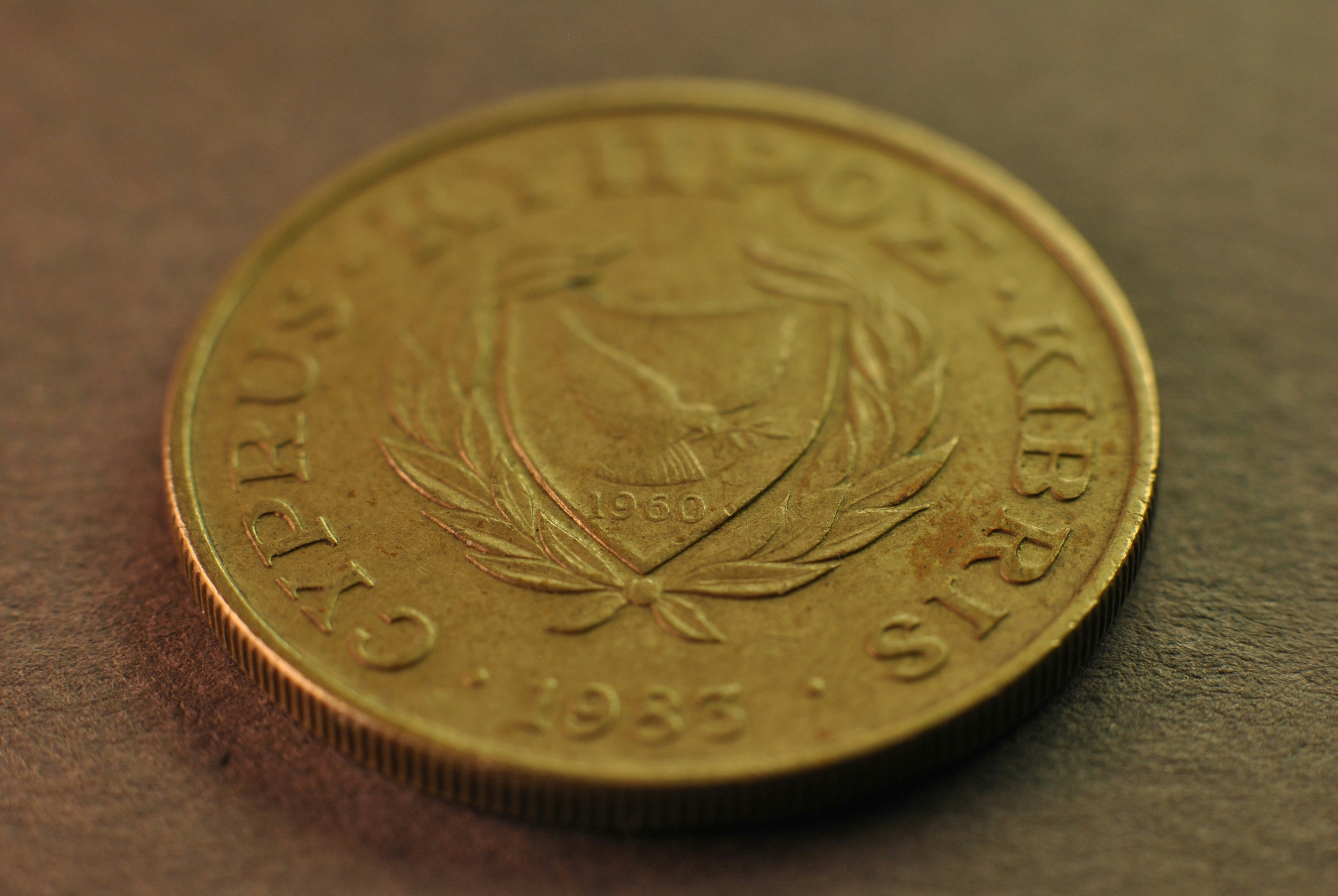A close up of a coin on a table