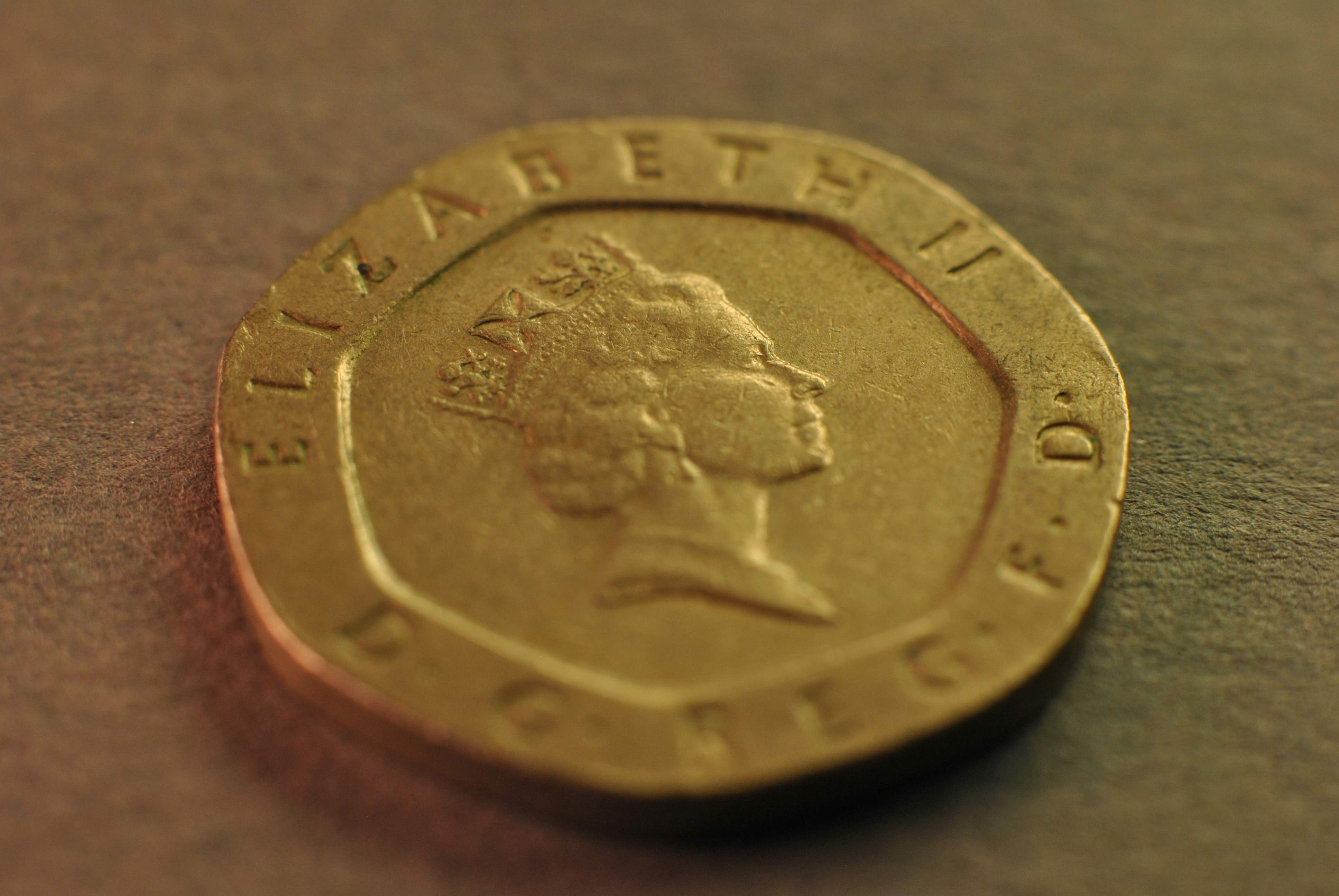 A close up of a coin on a table