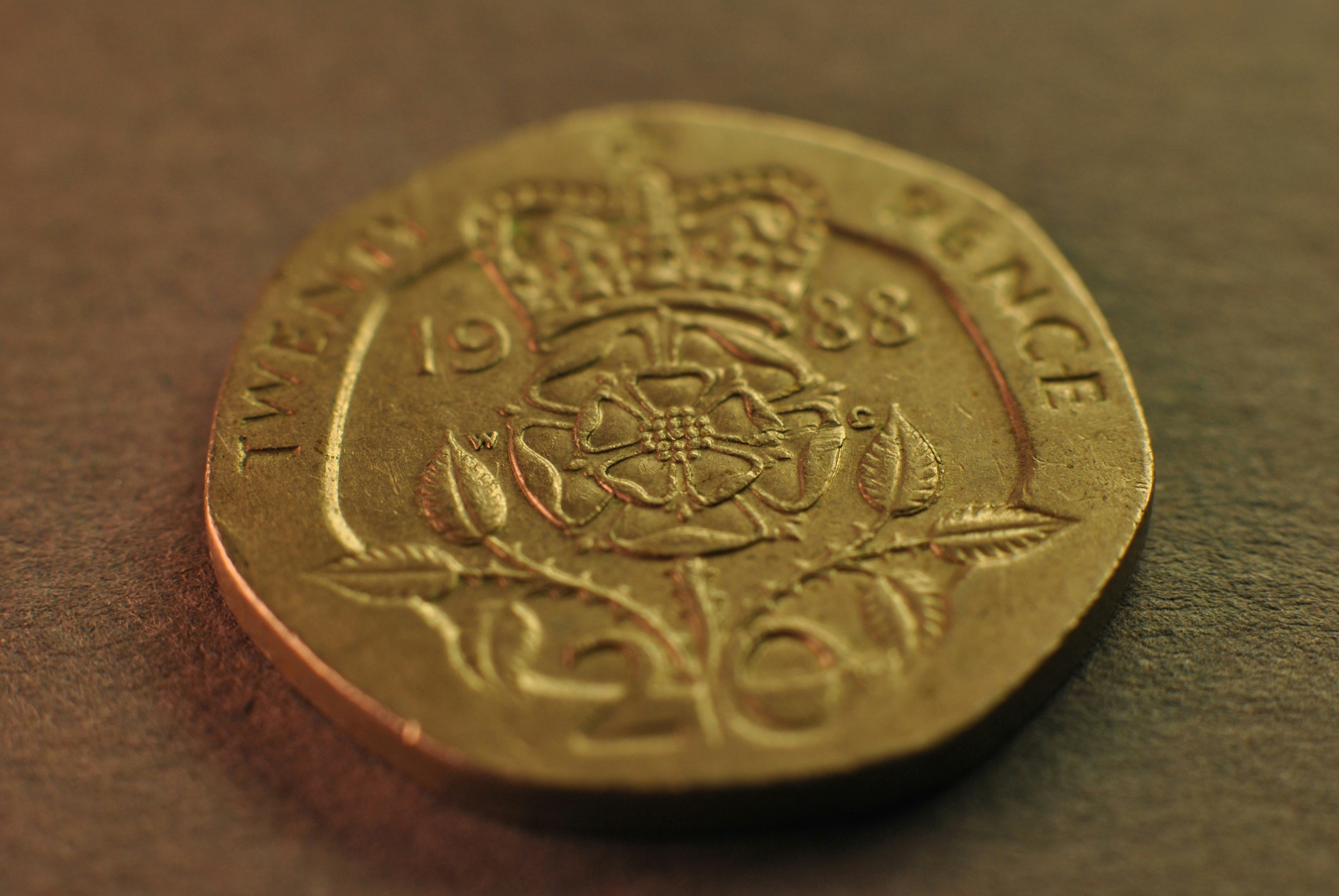 A close up of a coin on a table