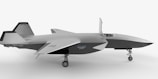A model of a fighter jet on a white background