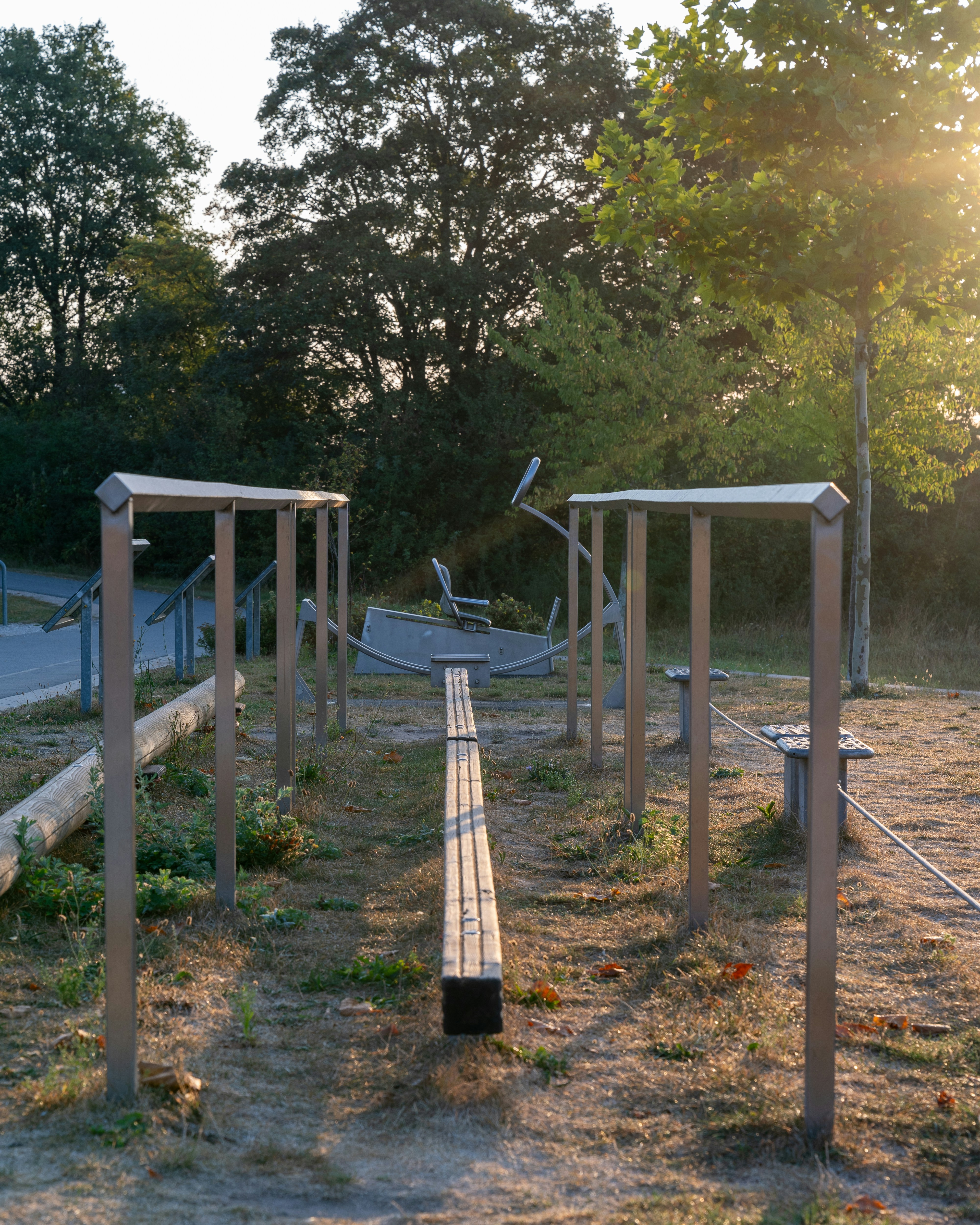 A row of benches sitting next to each other in a park