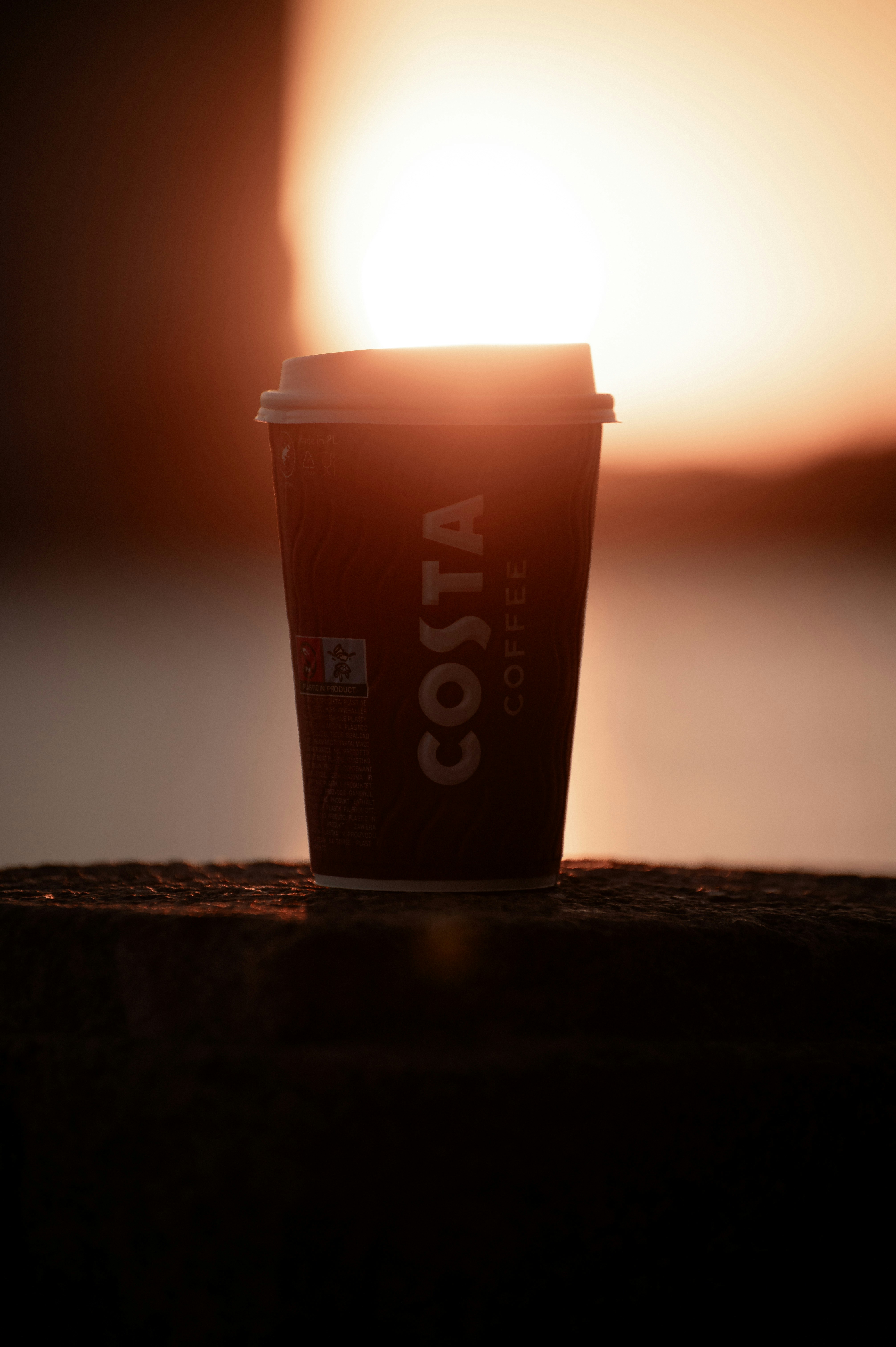 A cup of coffee sitting on top of a table