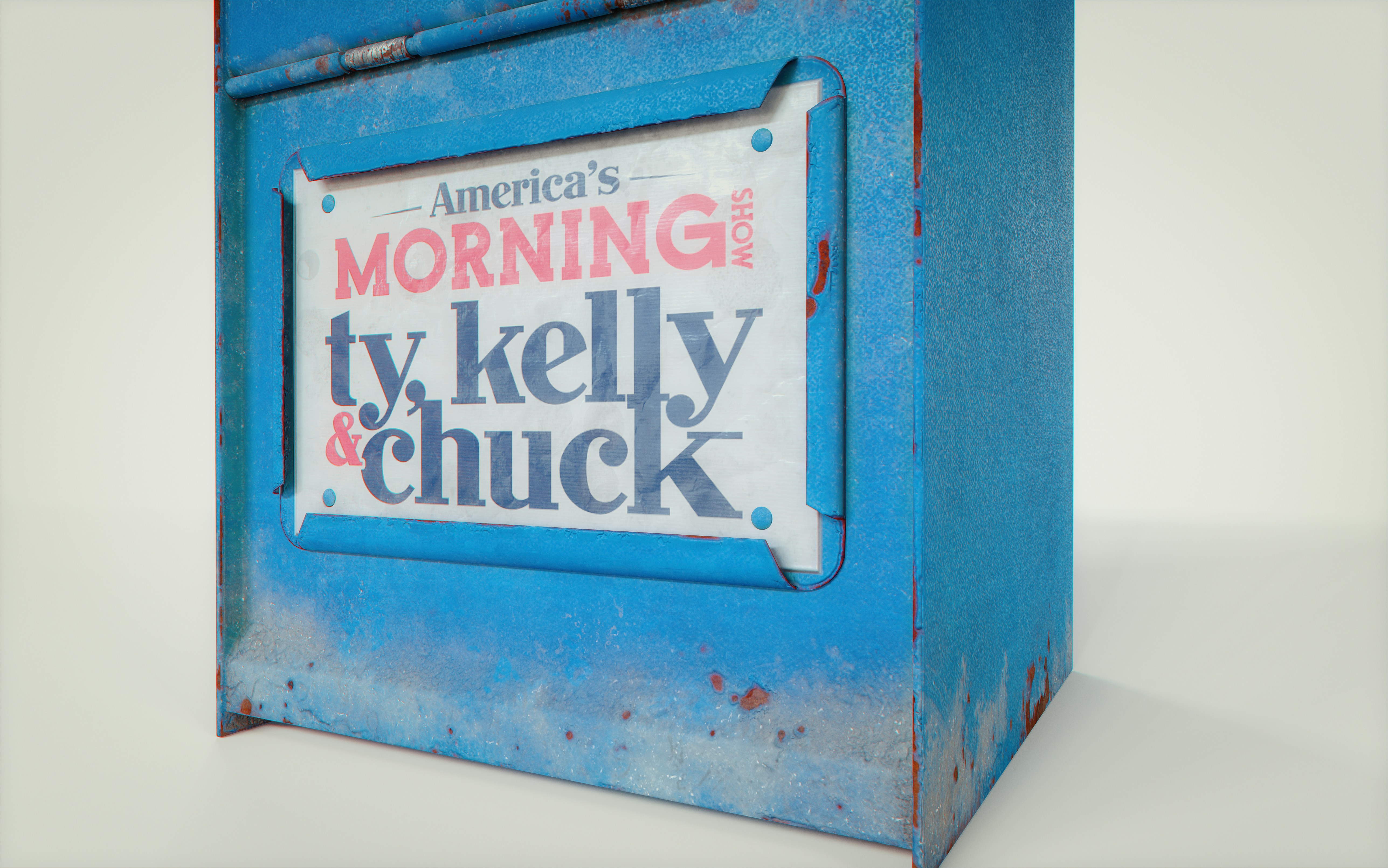 A blue box with a sign that says morning TV kelly and chuck