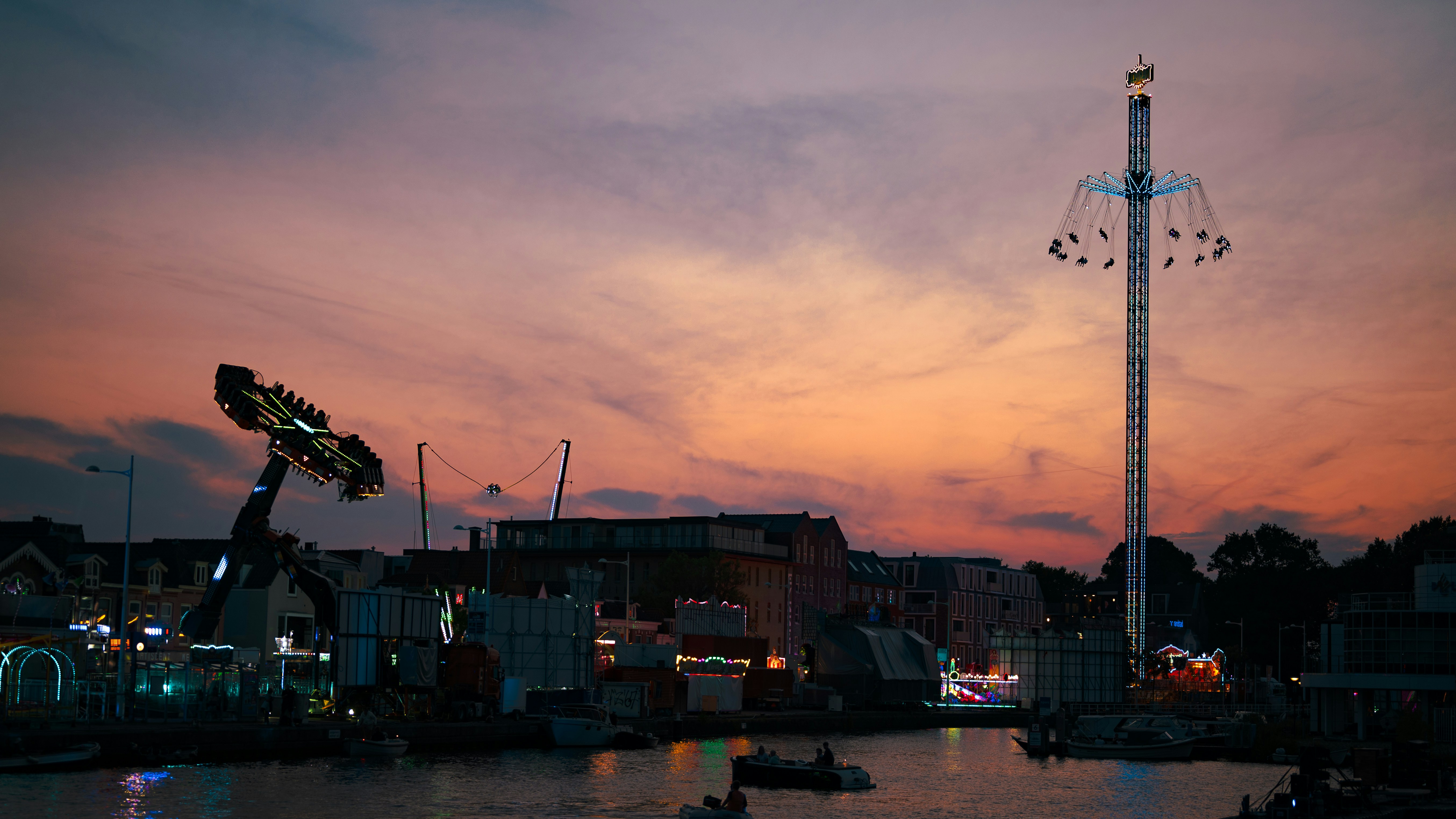 A view of a city at night from a boat